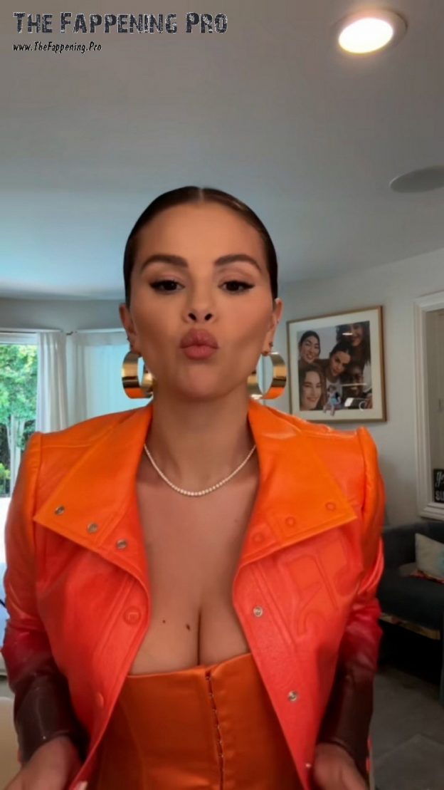 girleak.com > Selena Gomez > Selena Gomez Big Tits In Orange Dress (9 Photos And GIF)_67d8bc7fb728a.jpeg